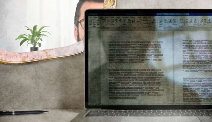 feature image shadow figure over word doc on laptop